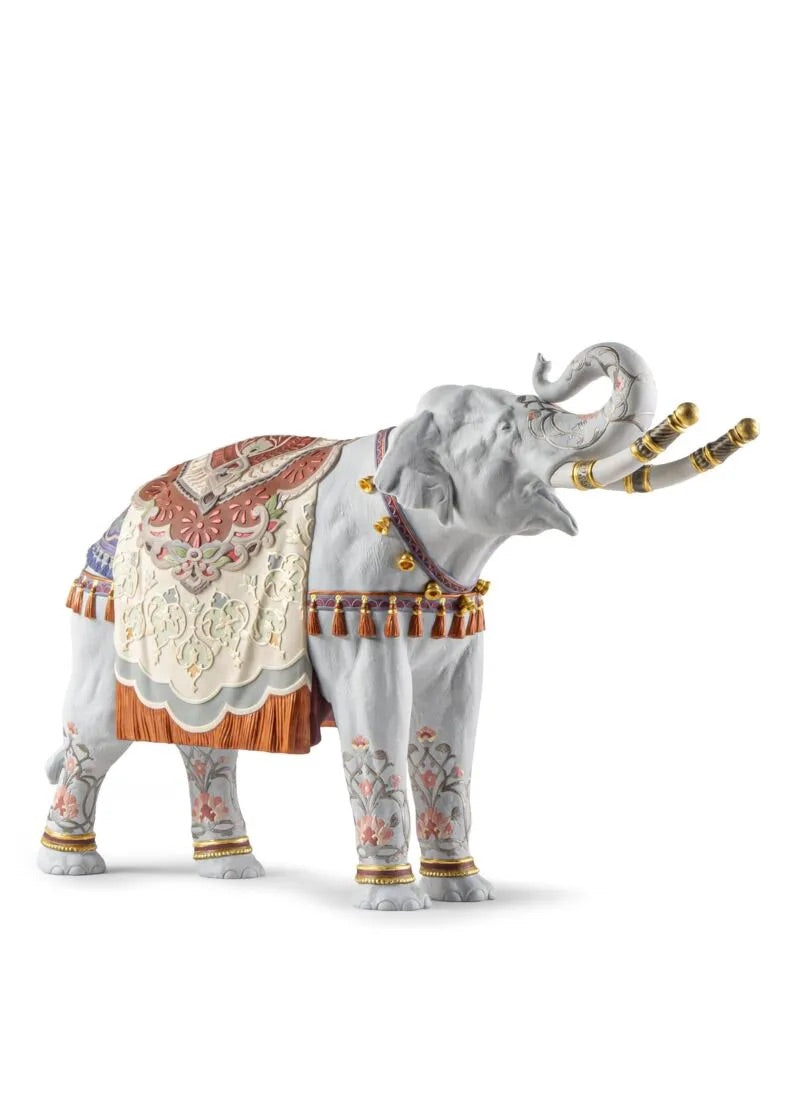 Decorative elephant figurine with colorful patterns on a white background