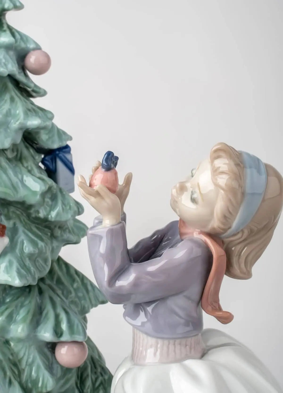 Lladró Trimming The Tree Children Figurine Sculpture by Lladró at FormFluent Sydney, Australia