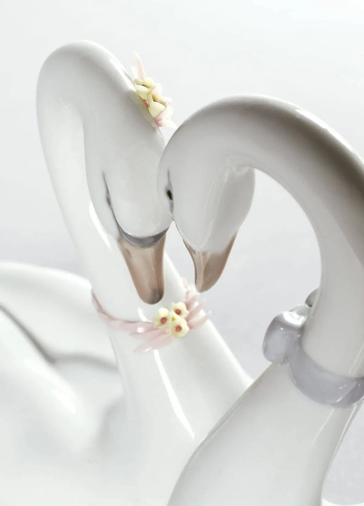 Lladró Endless Love Swans Heart Figurine - Pastel Sculpture by Lladró at FormFluent