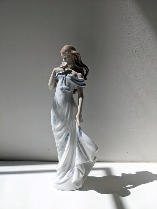 Lladró A Flower's Whisper Woman Figurine by Lladró at FormFluent