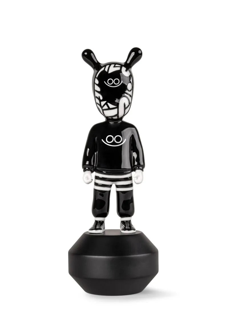 Black and white figurine on a white background