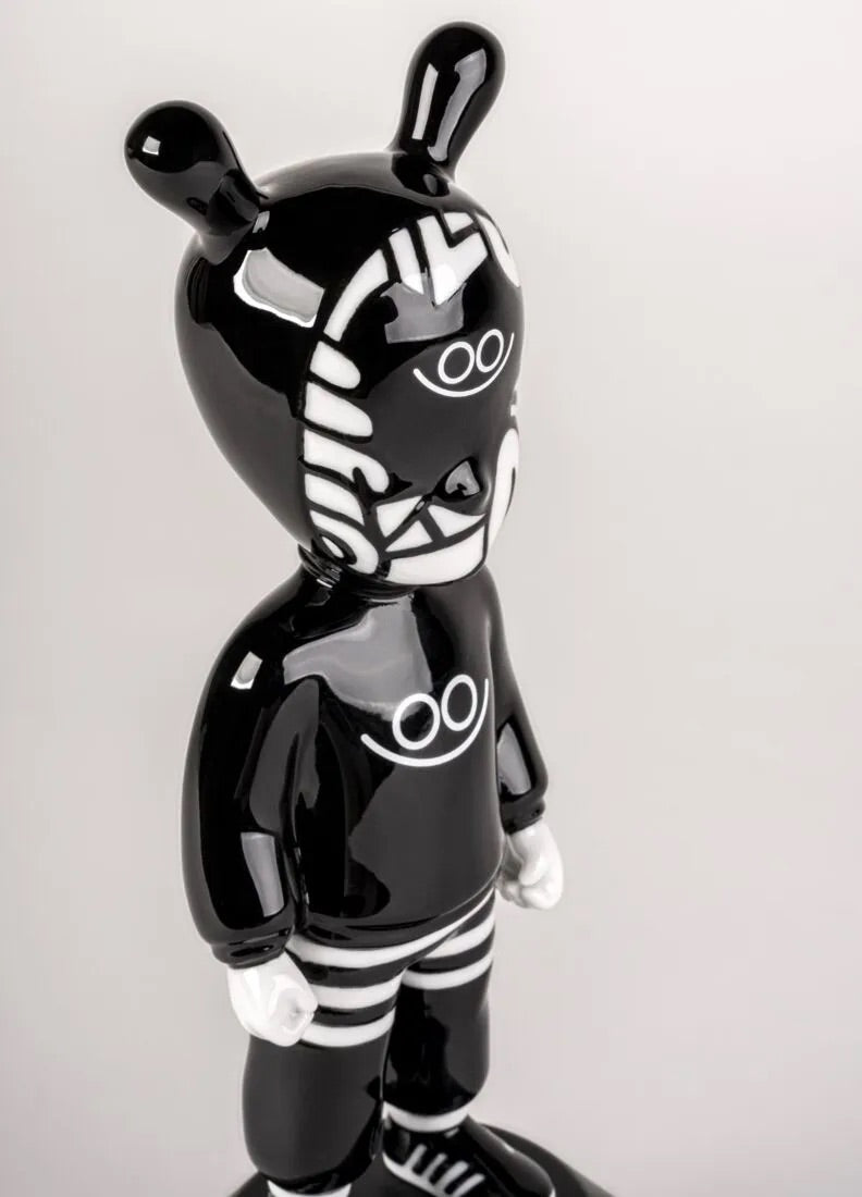Black and white character figure with striped pattern on a gray background