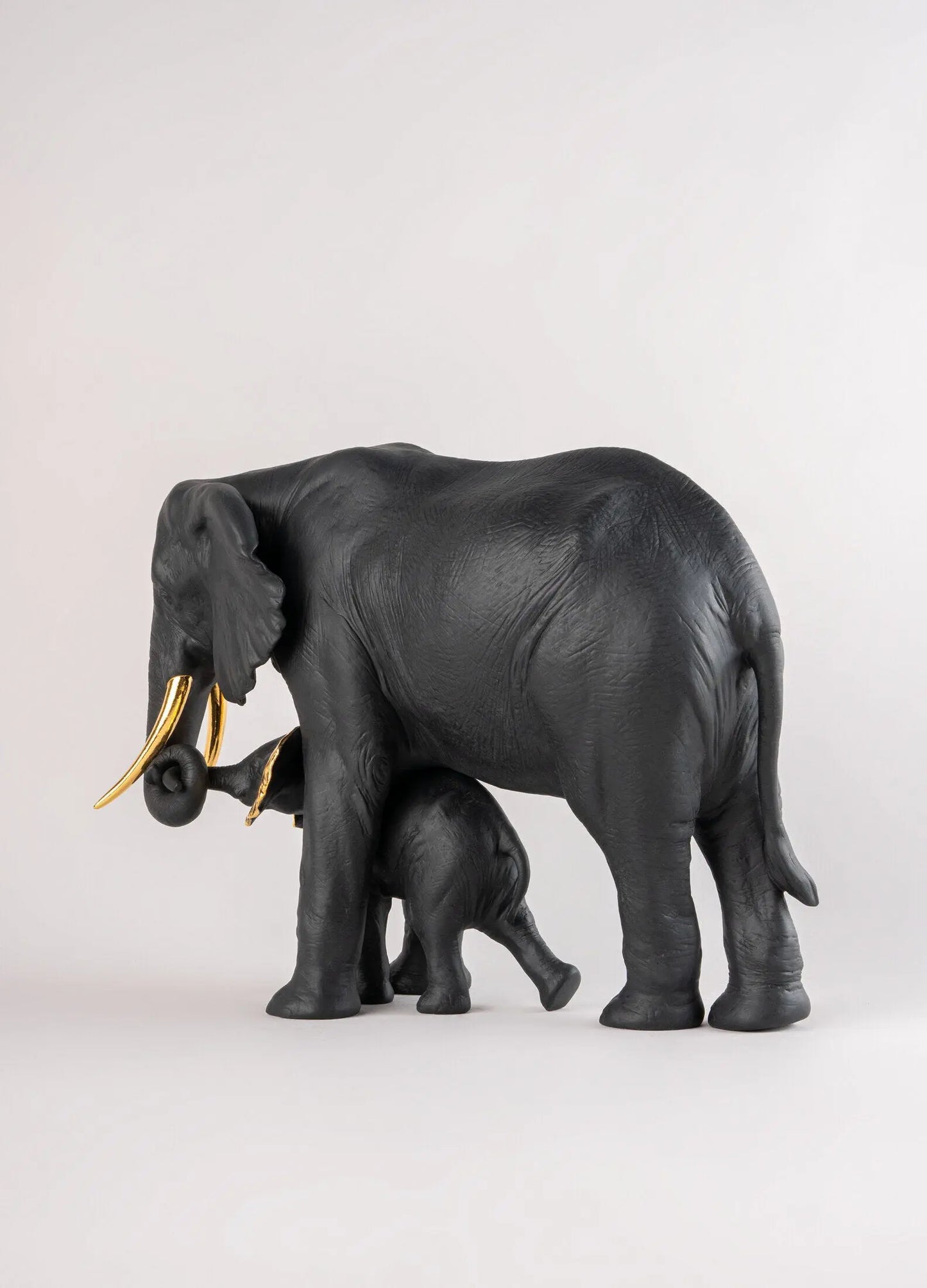 Lladró Boldblack Leading the Way Elephants Sculpture Black-Gold Limited Edition Sculpture by Lladró at FormFluent
