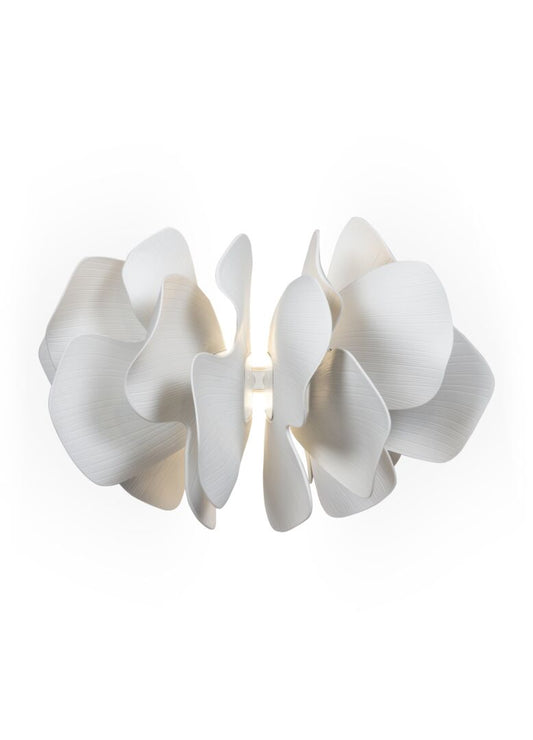Lladró Nightbloom wall sconce featuring elegant white porcelain flower petals