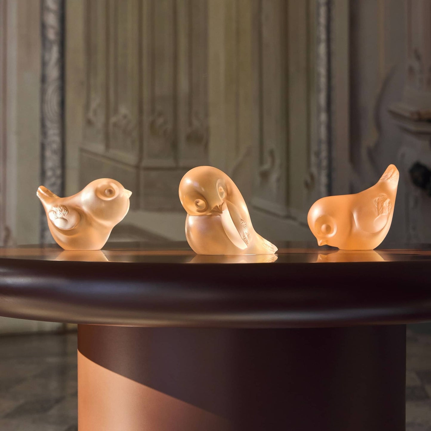 Lalique Piou-Piou Bird Head Down Sculpture - Clear with Coral Patina Crystal Sculpture by Lalique at FormFluent Sydney, Australia