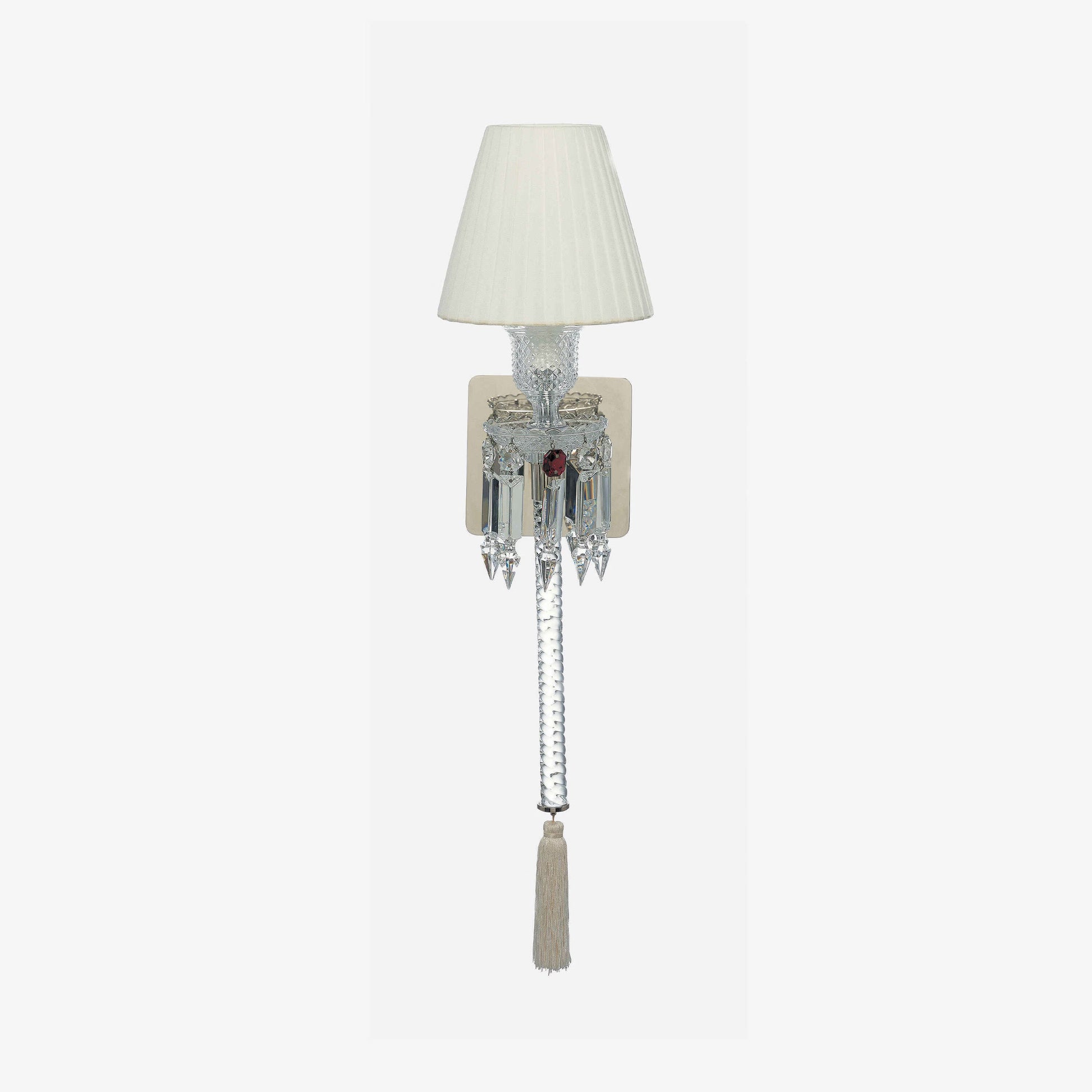 Wall-mounted lamp with a white shade and decorative elements on a light gray background