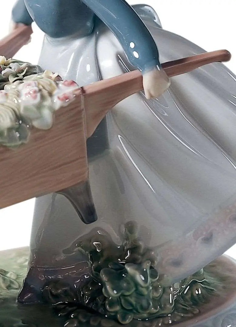 Lladró A Barrow of Fun Girl Figurine with Flowers Sculpture by Lladró at FormFluent
