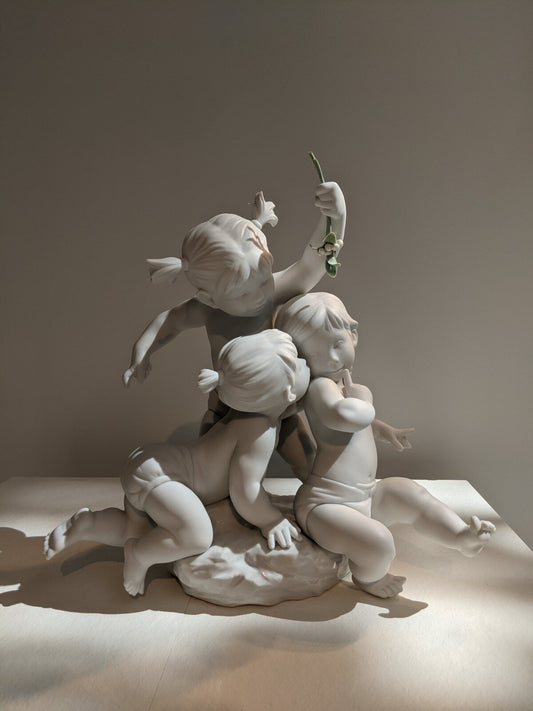 Lladró Kiss Under The Mistletoe Children Sculpture by Lladró at FormFluent