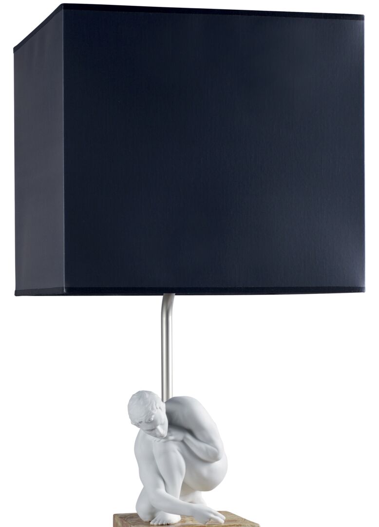 Lladró Scientia Table Lamp featuring a sculpted figure and a sleek navy shade