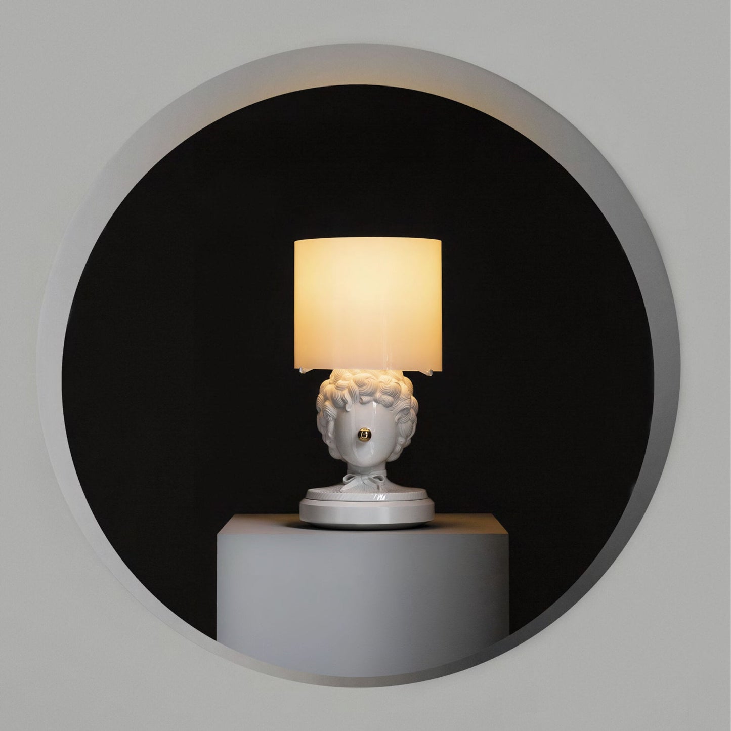 Lladró The Clown Table Lamp with a sculpted face base and soft, elegant shade for stylish lighting
