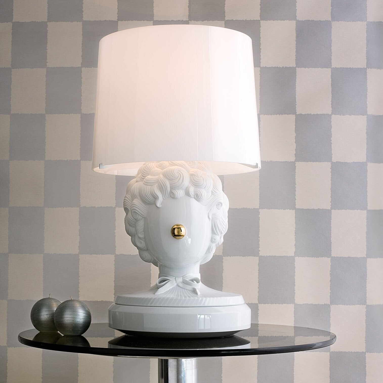 Lladró The Clown Table Lamp featuring a playful design with a white ceramic base and a fabric shade