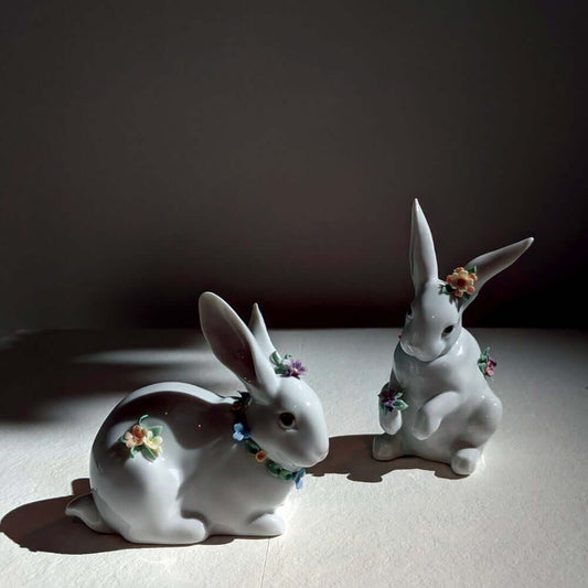 The Easter Bunny What Do Rabbits And Eggs Have To Do With Easter - 01006098 Lladro Attentive Bunny with Blue Flowers + 01006100 Lladro Sitting Bunny with Flowers - Window