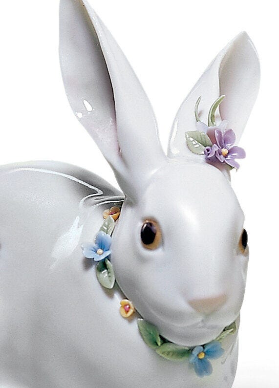 Lladró Attentive Bunny with flower
