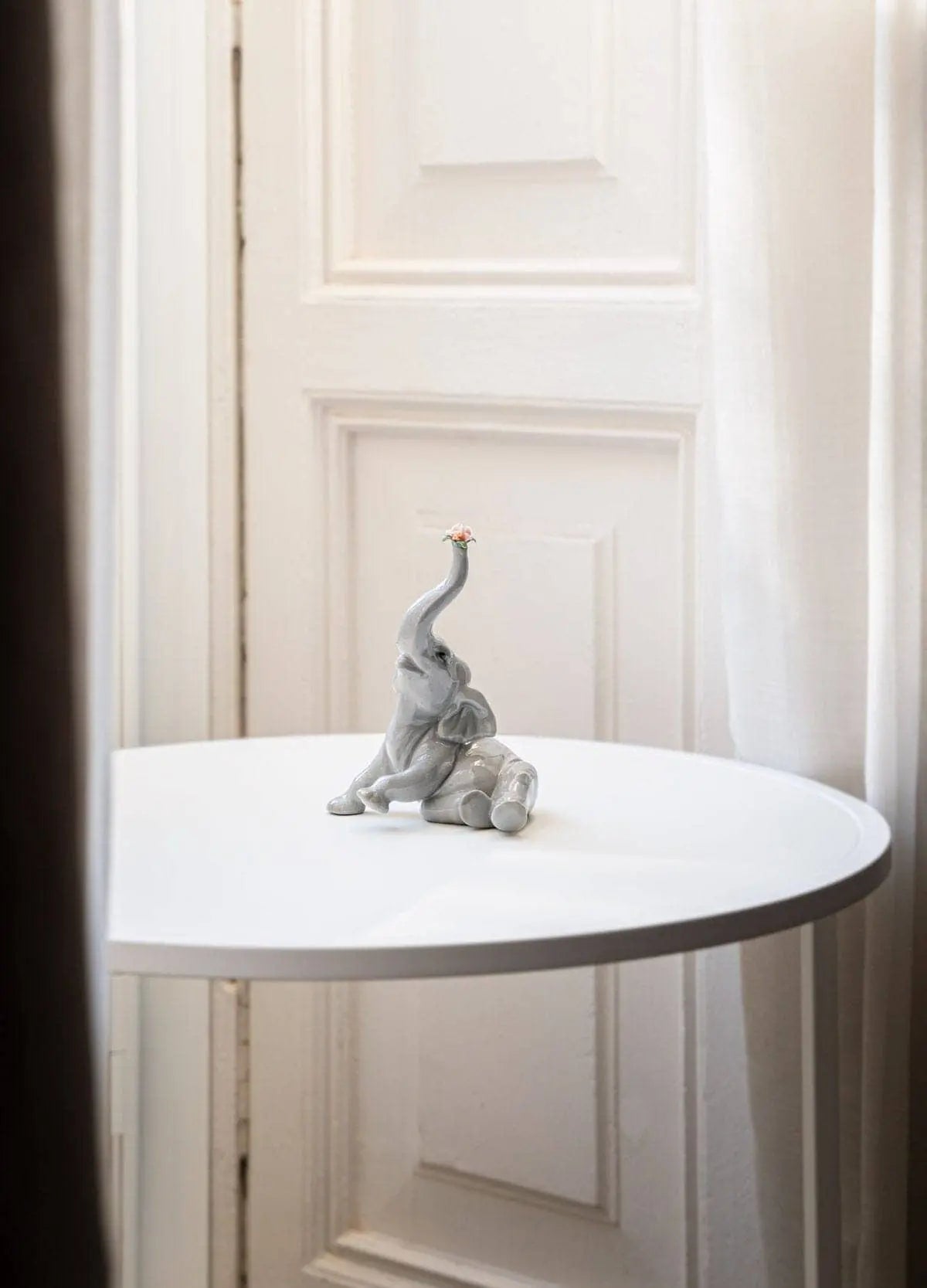 Lladró Baby Elephant with Pink Flower Sculpture | FormFluent