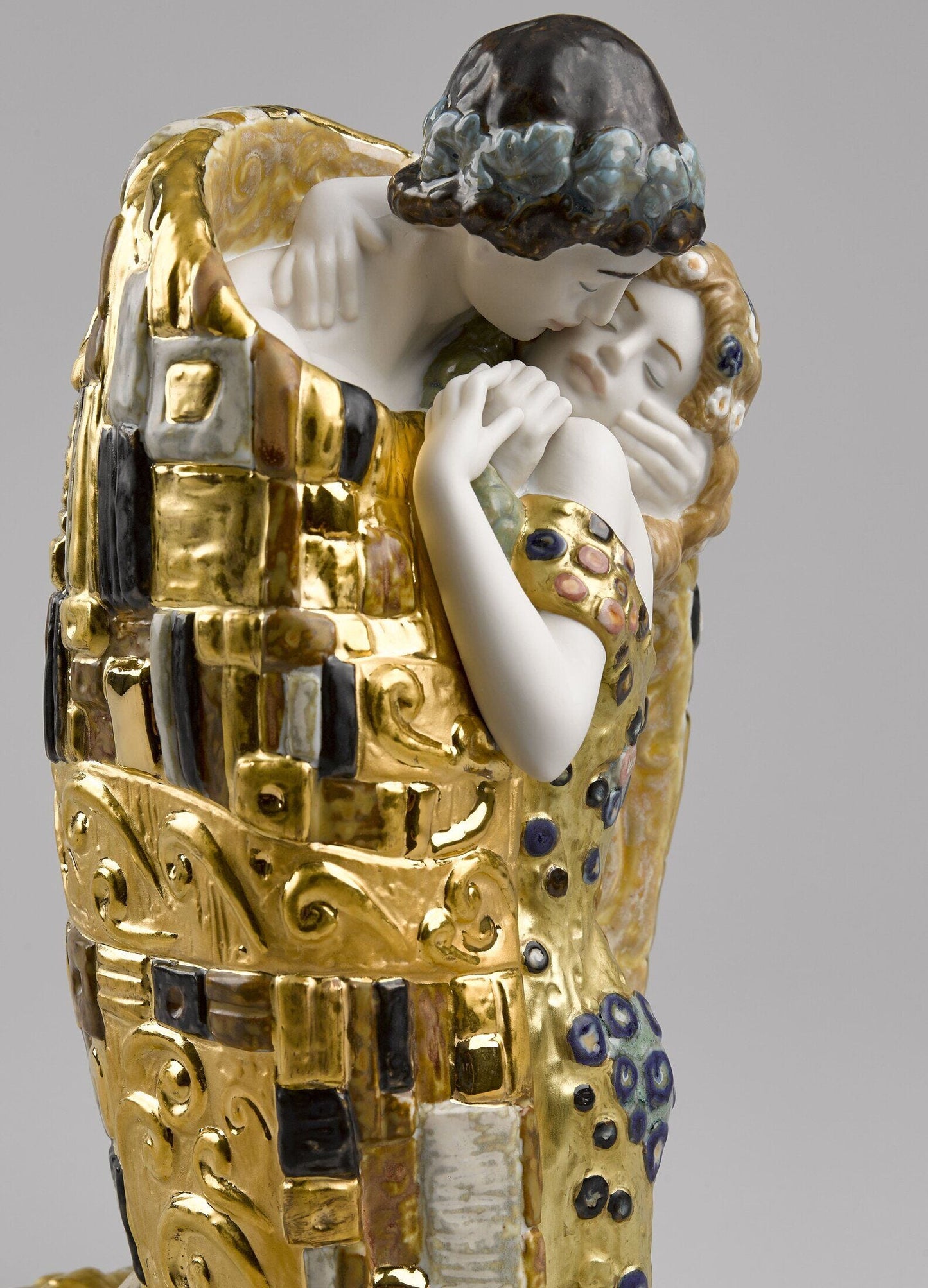 The Kiss Couple Sculpture. Matt and Gold Lustre