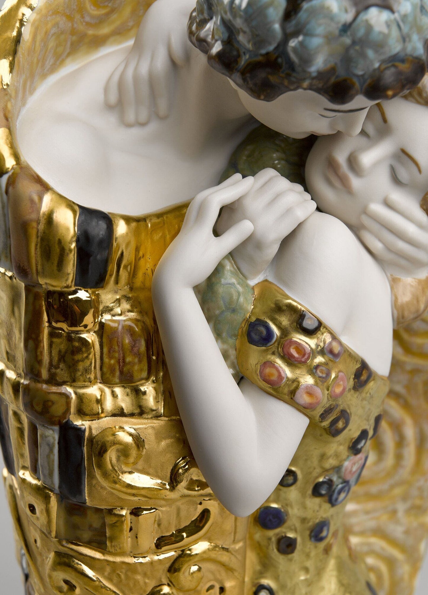 The Kiss Couple Sculpture. Matt and Gold Lustre