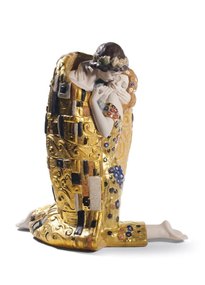 The Kiss Couple Sculpture. Matt and Gold Lustre