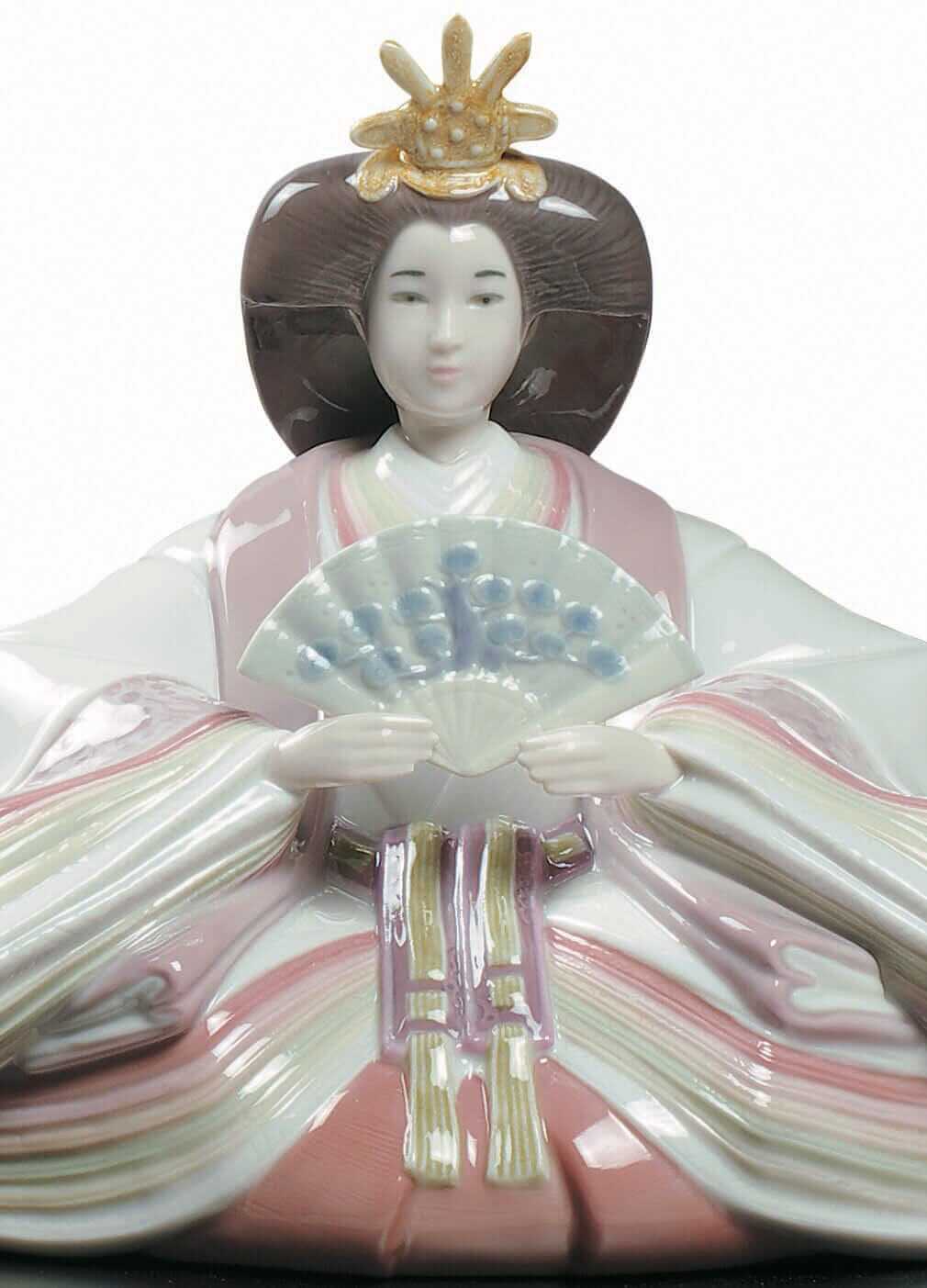 Hina Doll figurine featuring the empress in rich colors, showcasing traditional Japanese craftsmanship for Hina Matsuri.