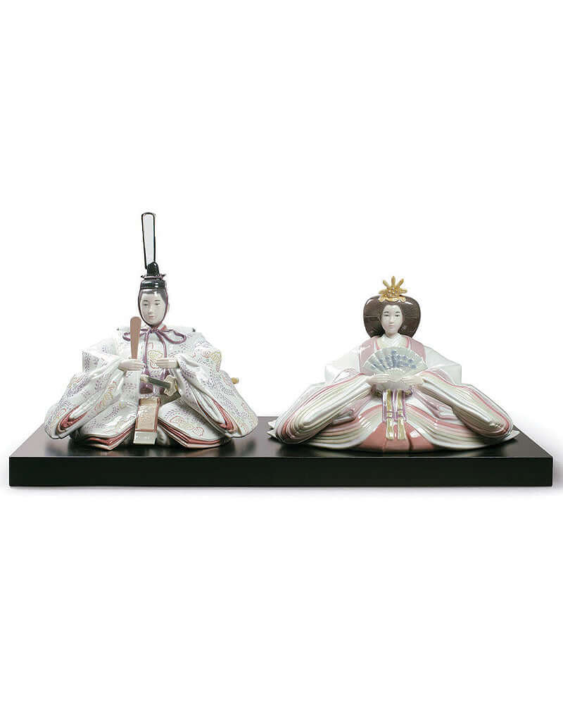 Hina Dolls limited edition figurines in vibrant porcelain for Hina Matsuri celebrations, featuring a royal couple on a stand.