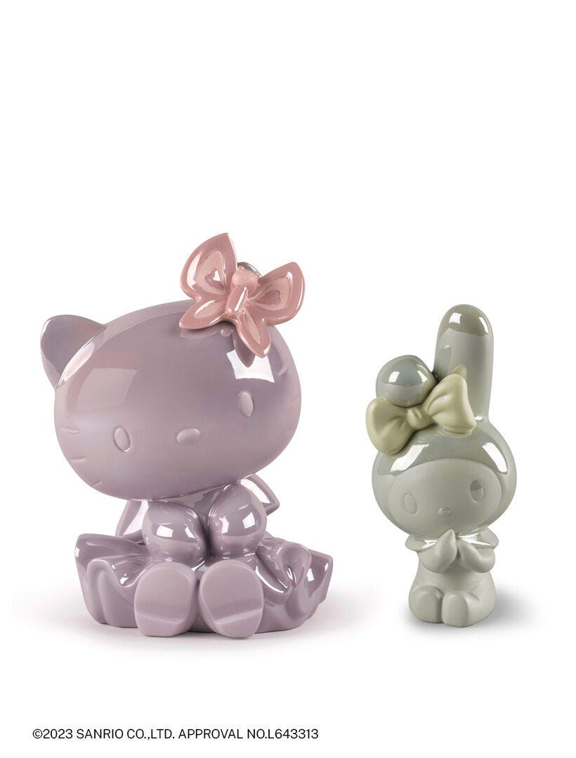 Lladro Hello Kitty Figurine Purple Pink with Melody Figurine in Green