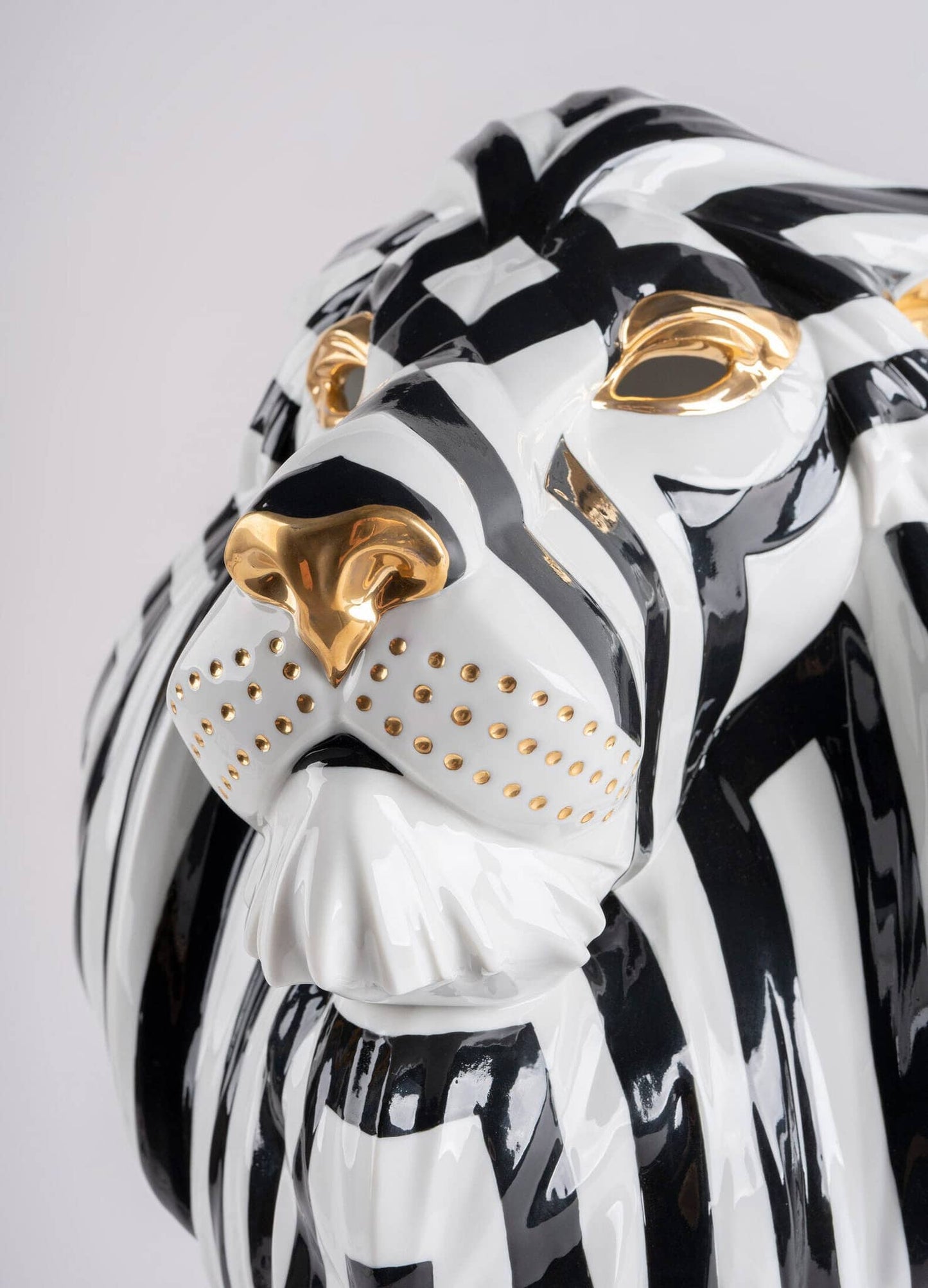 Lladró Black and Gold African Lion Mask Sculpture by  Lladró at   FormFluent Sydney, Australia