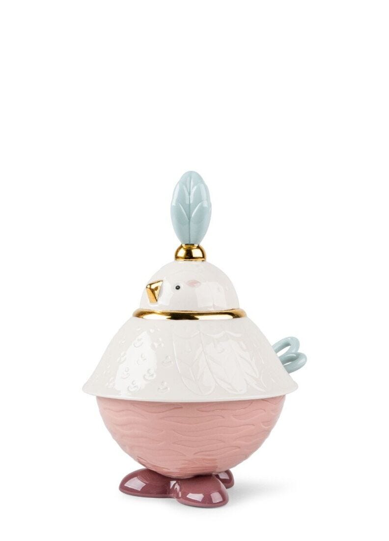 Decorative bird-shaped container with a white body and pink base on a white background