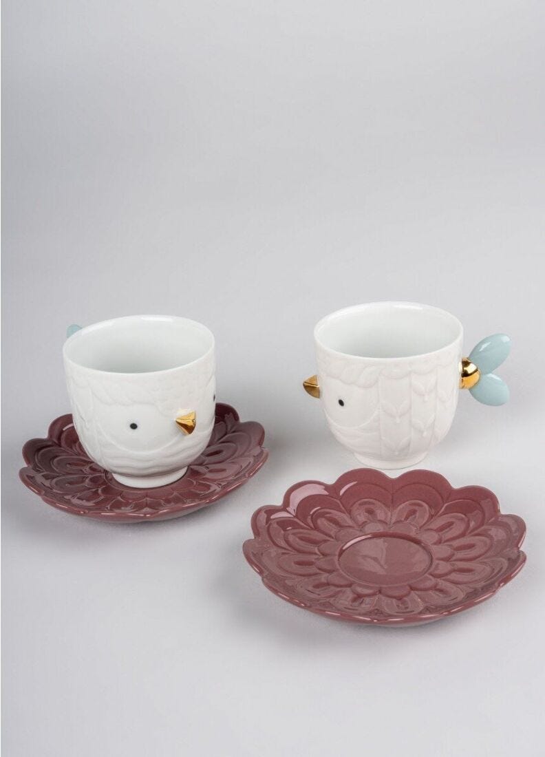 Set of porcelain cups and saucers from the Kawki collection designed by Aleksandra Zeromska, a charming coffee set inspired by Slavic folklore and a love for birds.
