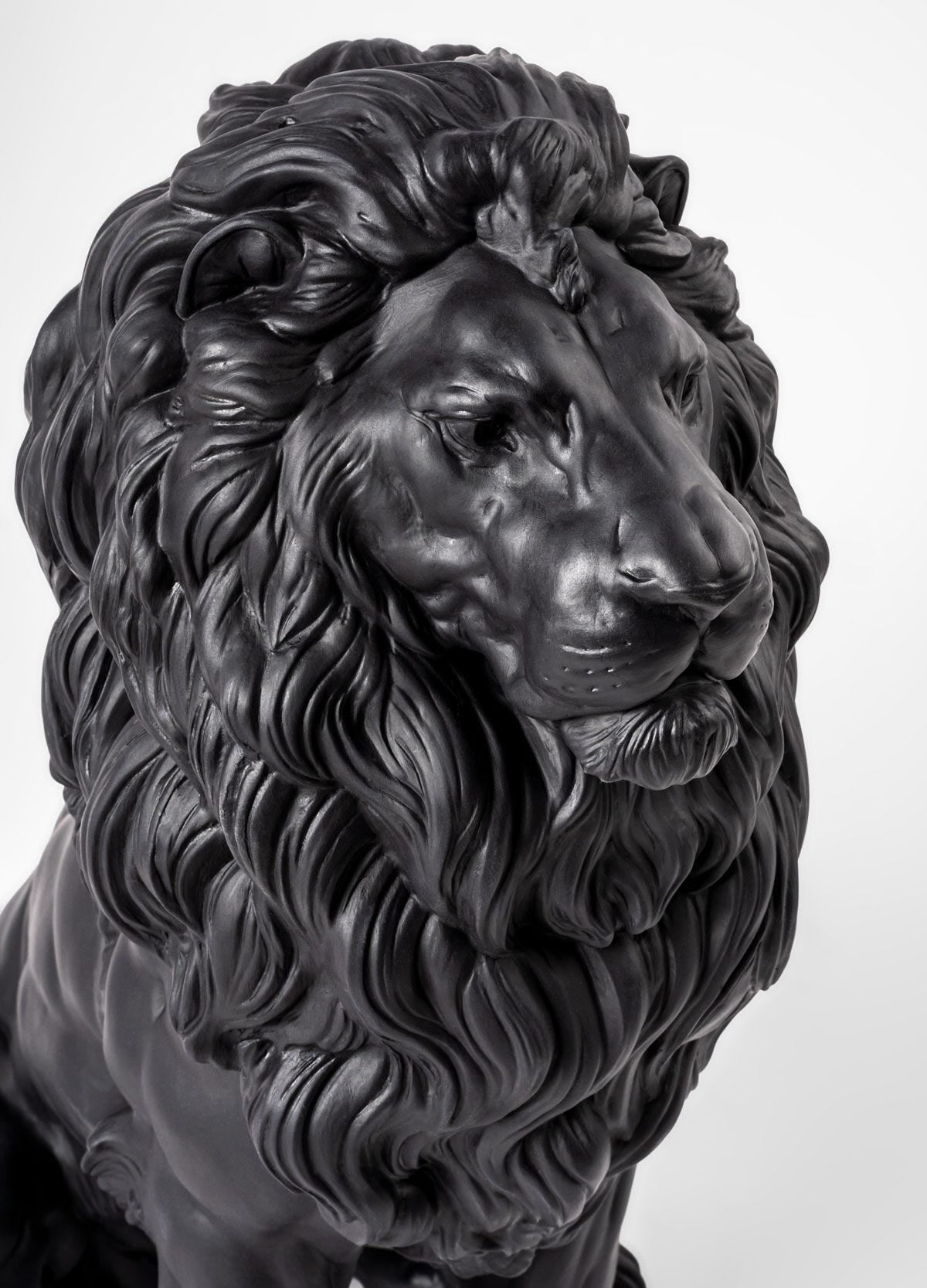 Majestic Lladró Lion Sculpture in matt black porcelain, showcasing strength and nobility, from FormFluent Sydney Australia.