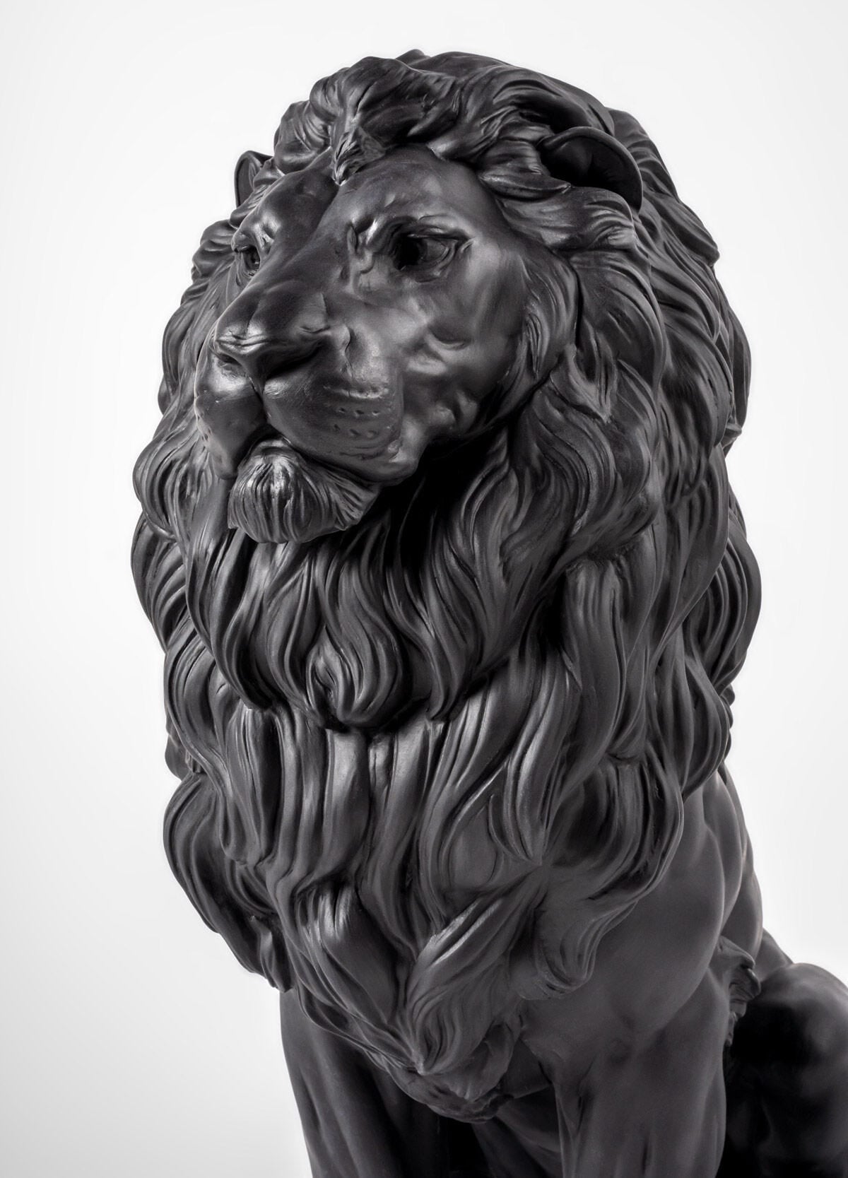 Lladró Majestic Lion Sculpture in matt black porcelain, showcasing strength and nobility, available at FormFluent Sydney Australia.