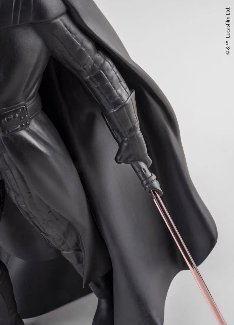 Close-up of a character in a dark costume holding a lightsaber on a plain background