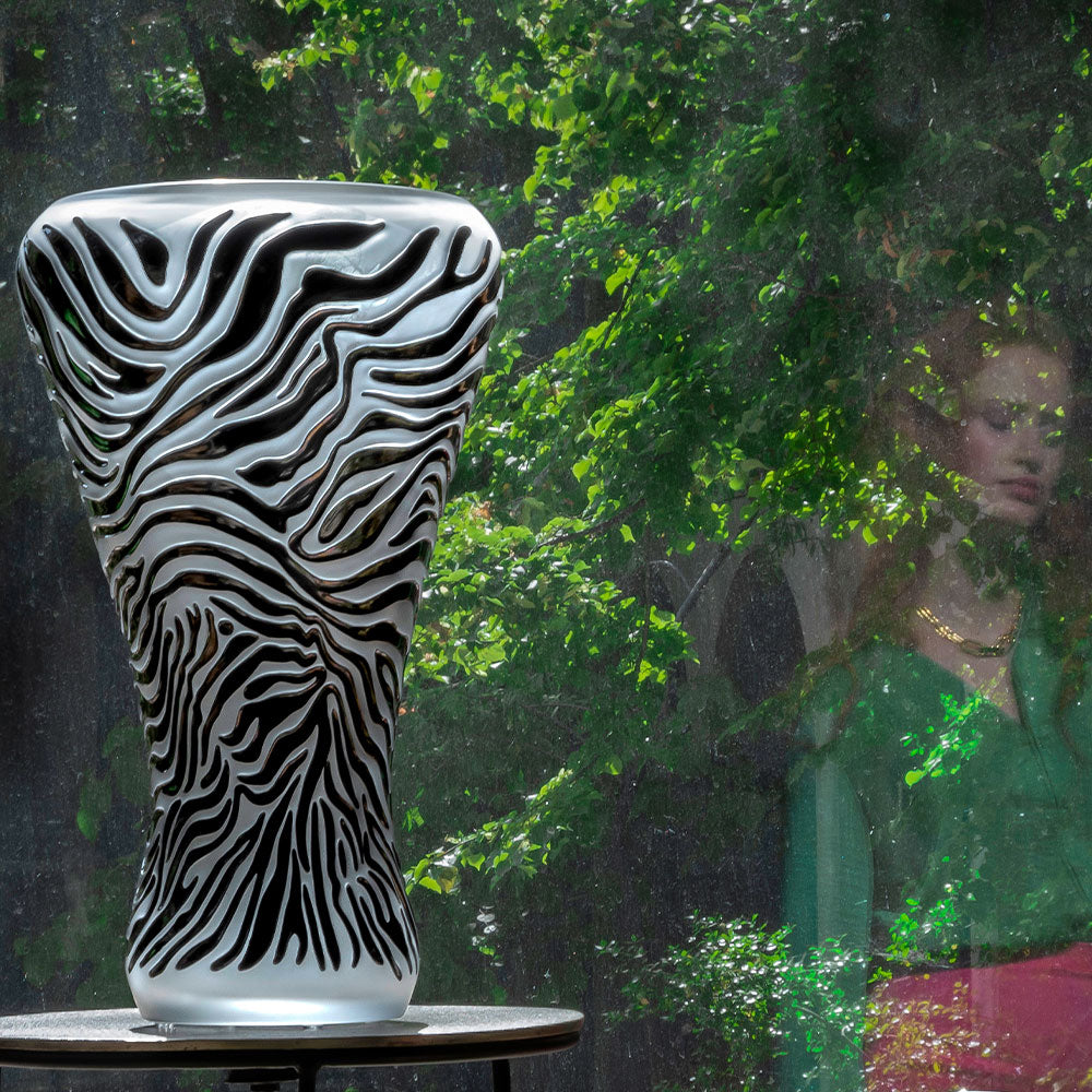 Zèbre Vase Limited Edition Lalique with greenery in the background