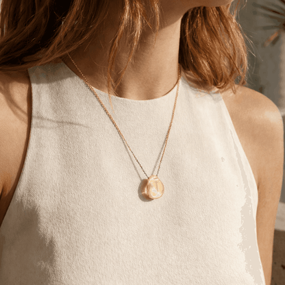 Lalique Cabochon Pendant Necklace - Gold Lustre Crystal 18K Yellow Gold Plated Jewelry by  Lalique at   FormFluent Sydney, Australia