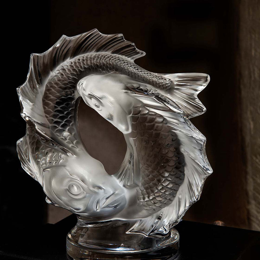 Double Fish Sculpture Lalique clear crystal in dark room