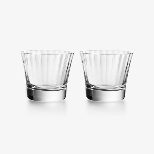 Two clear glass tumblers on a white background
