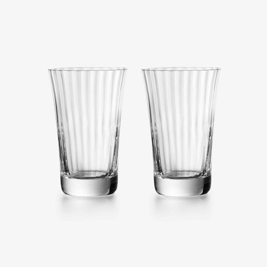 Two clear glass tumblers with vertical stripes on a white background