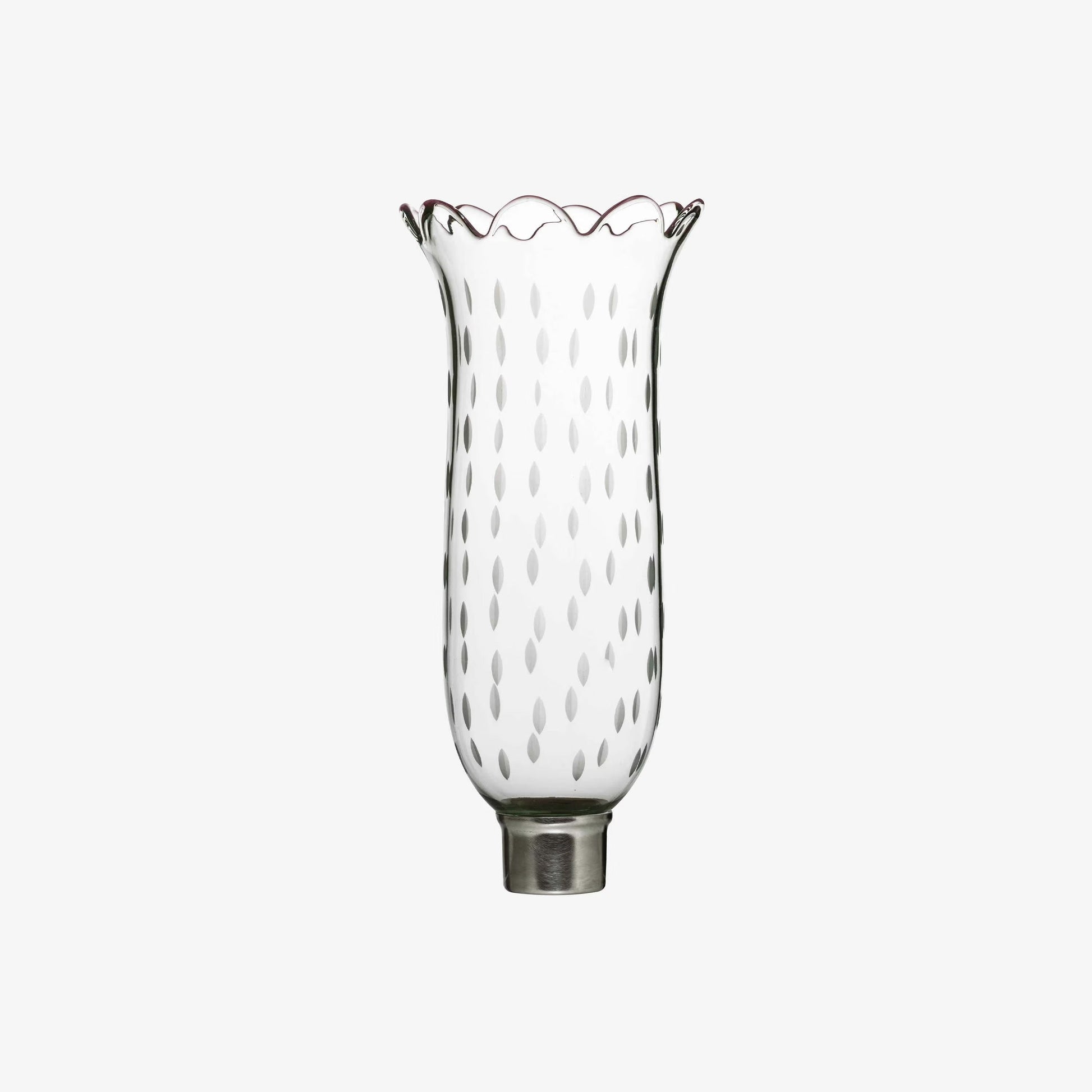 Hand-cut crystal artistry with a scalloped rim and rice grain motif, blending elegance and light.