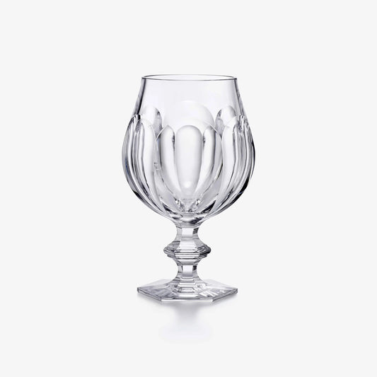 Clear glass goblet on a white background