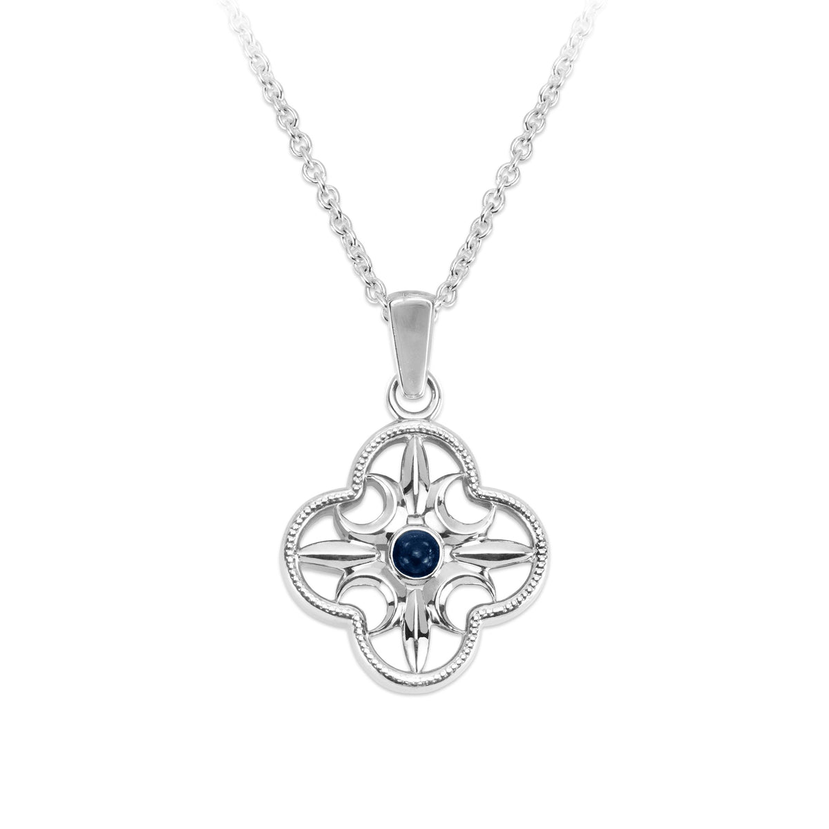 Comyns cross pendant and necklace with detailed design and a centre blue gemstone