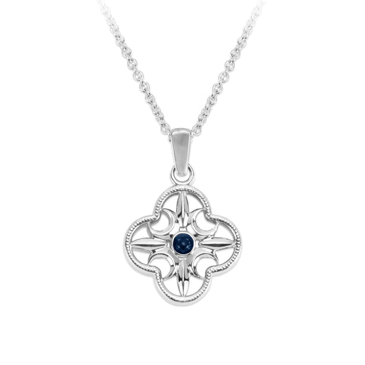 Comyns cross pendant and necklace with detailed design and a centre blue gemstone