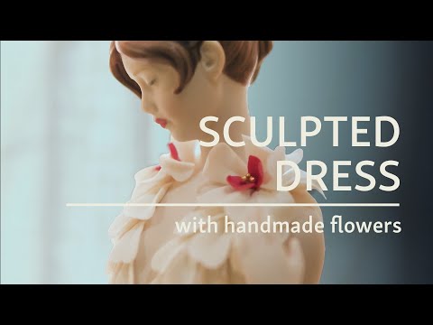 Youtube video of Lladro's Haute Haute Allure Exquisite Embroidery Sculpture. The text on the thumbnail says: Sculpted dress with handmade flowers. 