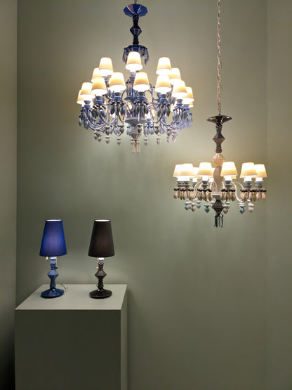 Lladró decorative chandelier collection featuring elegant designs and soft lighting in various colours